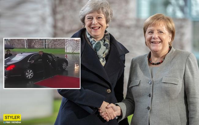 Неприємний конфуз: Тереза Мей не змогла вийти з автомобіля до Меркель