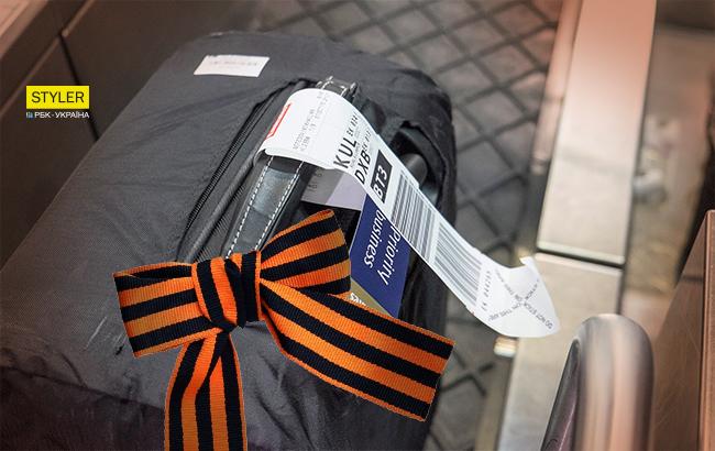 "Нехай щастить": у столичному аеропорту прикордонники "завернули" росіян з георгіївськими стрічками на валізі