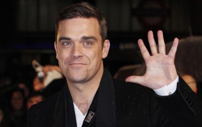 Робби Уильямс продаст награды и личные вещи ради детей