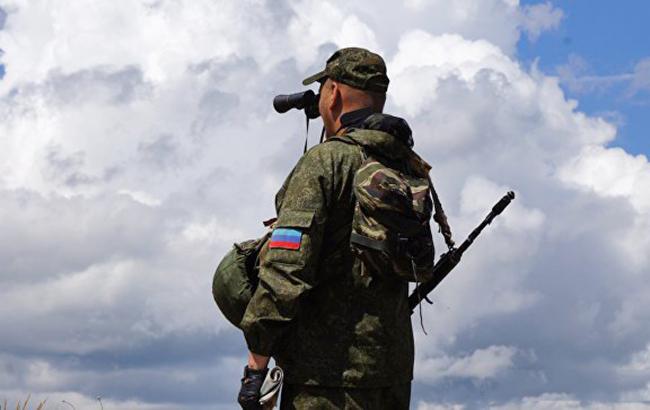 Фото: боевик на Донбассе (dnr-news.com)