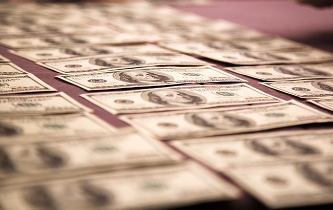Курс доллара перешел к росту на открытии межбанка