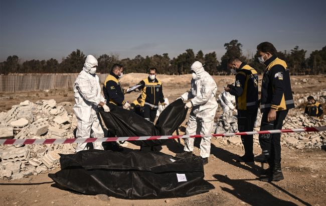 По меньшей мере 100 тысяч погибших. Правозащитники провели эксгумацию жертв режима Асада