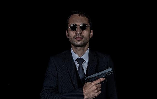 "Кондуктор?" У київській маршрутці помітили чоловіка з пістолетом (фото)