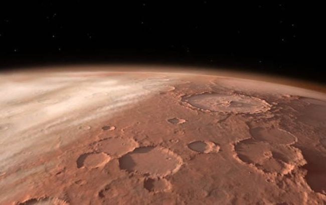 Ледяной кратер на Марсе: орбитальный зонд сделал потрясающий снимок