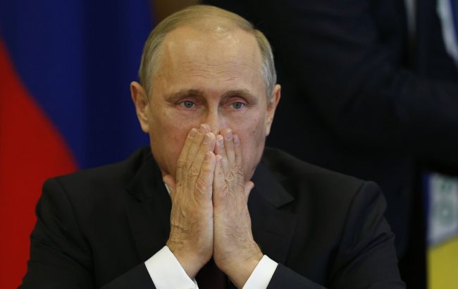 Путин за 2014 г. заработал в почти три раза меньше Обамы