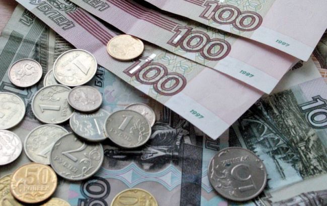 Курс рубля на Московской бирже вырос по отношению к евро и доллару