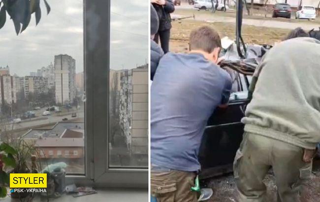 Люди спасли водителя, на авто которого умышленно наехал танк в Киеве (видео)