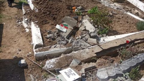 Боевики "ЛНР" проехали танком по кладбищу: оставили разрушенные могилы