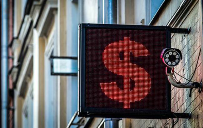 У Росії біржовий курс долара злетів вище 58 руб