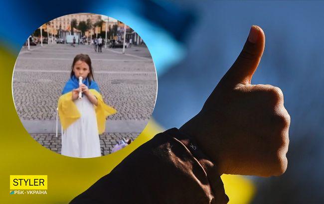 У Дніпрі 6-річна дівчинка грою на флейті збирає гроші на армію (відео)