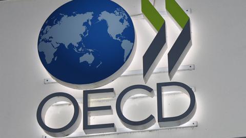ОЕСР знизила прогноз зростання світової економіки